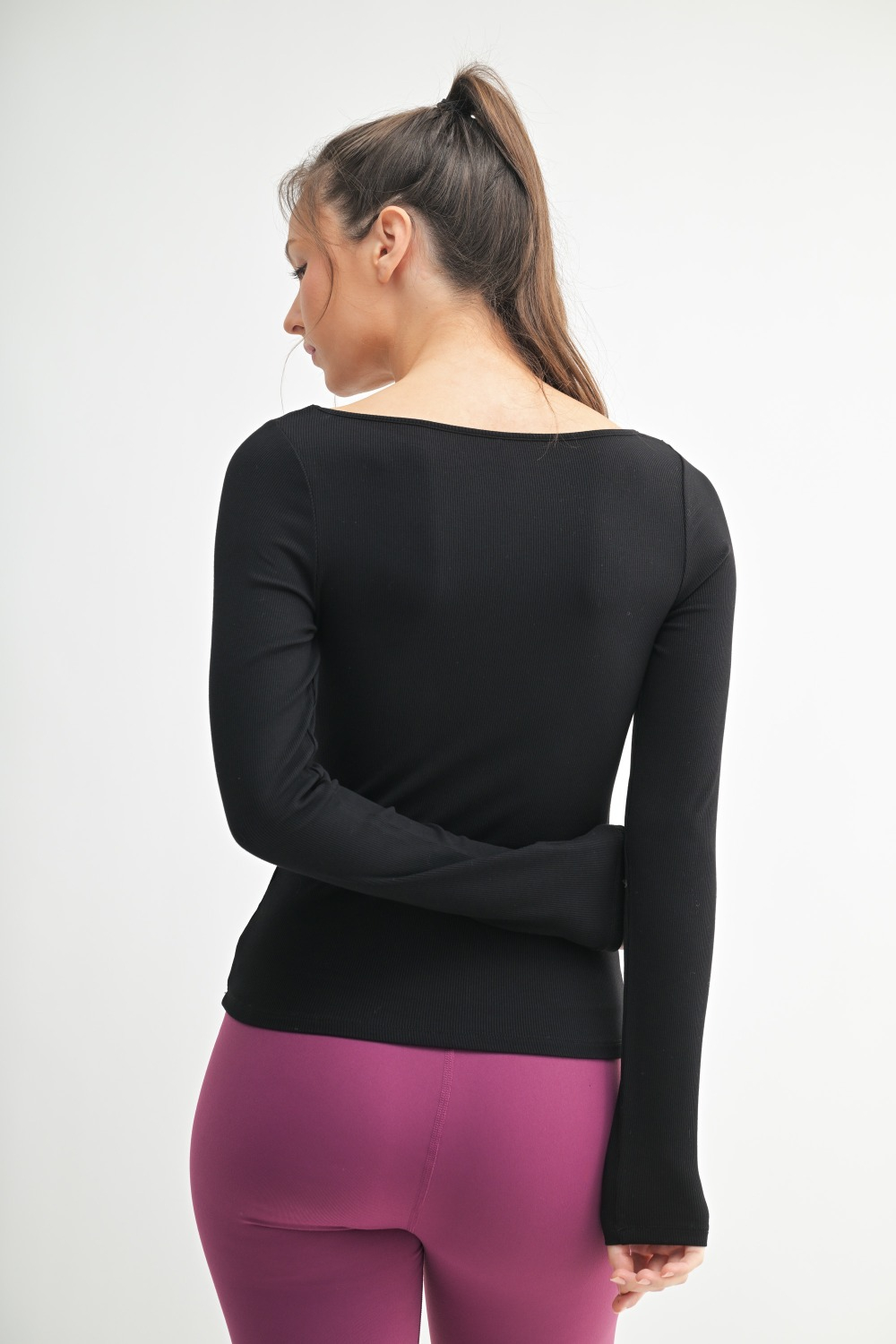 Basic White: Front view of SleekFit Boat Neck Ribbed Long Sleeve Top in Basic White – slim-fit stretchy women’s top with boat neckline Black: Front view of SleekFit Boat Neck Ribbed Long Sleeve Top in Black – fitted long sleeve top with boat neck in soft ribbed fabric