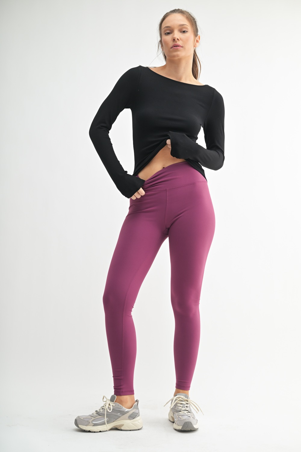 Basic White: Front view of SleekFit Boat Neck Ribbed Long Sleeve Top in Basic White – slim-fit stretchy women’s top with boat neckline Black: Front view of SleekFit Boat Neck Ribbed Long Sleeve Top in Black – fitted long sleeve top with boat neck in soft ribbed fabric