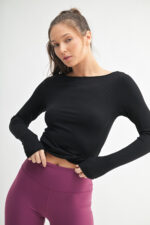 Basic White: Front view of SleekFit Boat Neck Ribbed Long Sleeve Top in Basic White – slim-fit stretchy women’s top with boat neckline Black: Front view of SleekFit Boat Neck Ribbed Long Sleeve Top in Black – fitted long sleeve top with boat neck in soft ribbed fabric